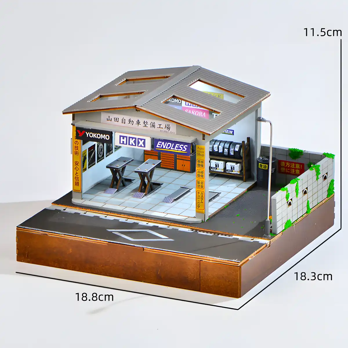 Dimensions of Yamada Auto Repair Garage Miniature House: 18.8 cm width, 18.3 depth.