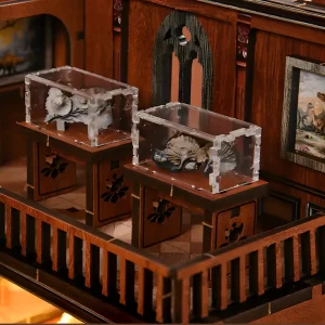 Miniature Fossil Display in acrylic cases inside a DIY Book Nook Kit gallery wing.