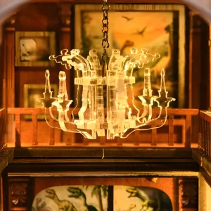 Glowing Crystal Chandelier lighting up a Miniature Museum Ancient Life gallery in DIY Book Nook.