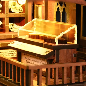 Detailed Miniature Fossil Display inside a glass-style cabinet within the Fossil Museum Book Nook.