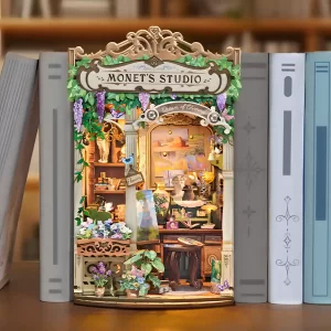 Monet's Impression Book Nook displayed on bookshelf, Art-themed book nook display.