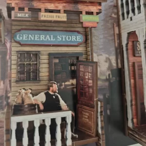 General Store storefront with wooden barrels, DIY Book Nook Kit Western Town architecture.