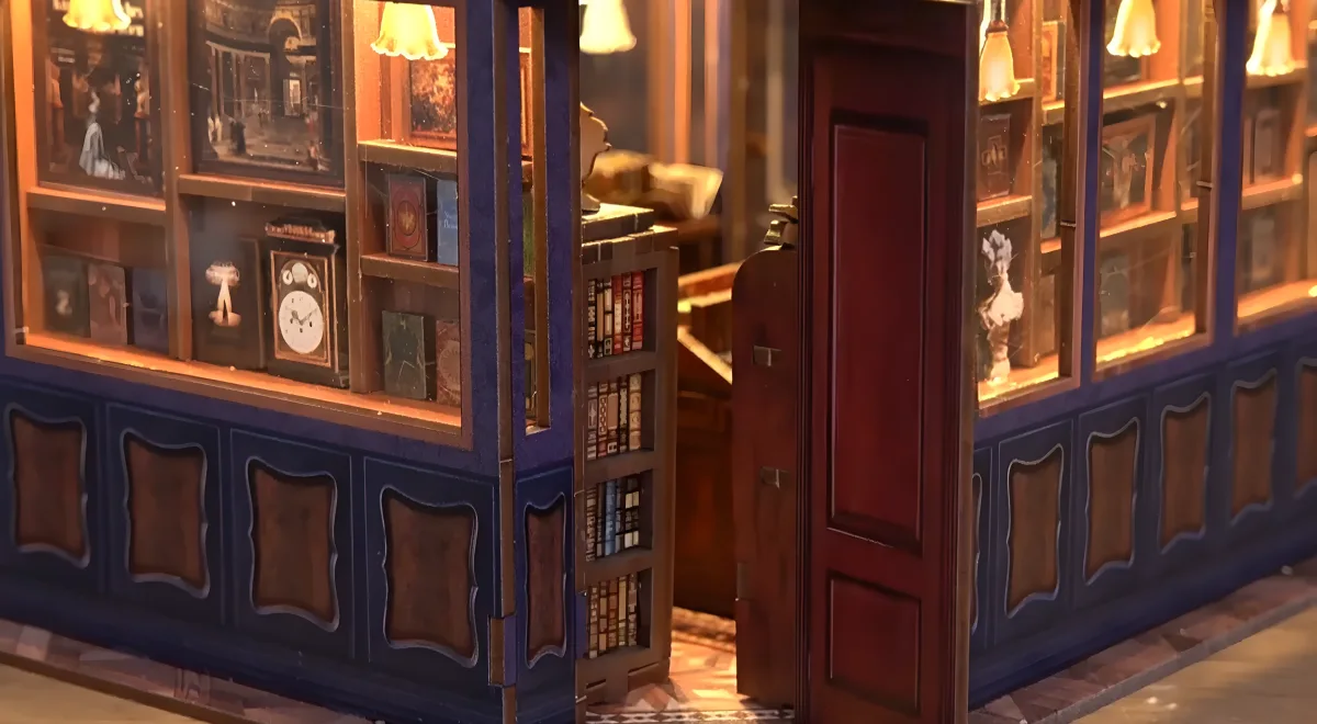 Side view of Notting Hill Stories DIY miniature house entrance, cozy bookshop kit storytelling details.