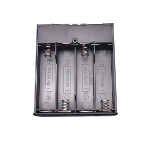 Internal compartment of a 4-cell AA battery box with switch showing high-quality contact springs.