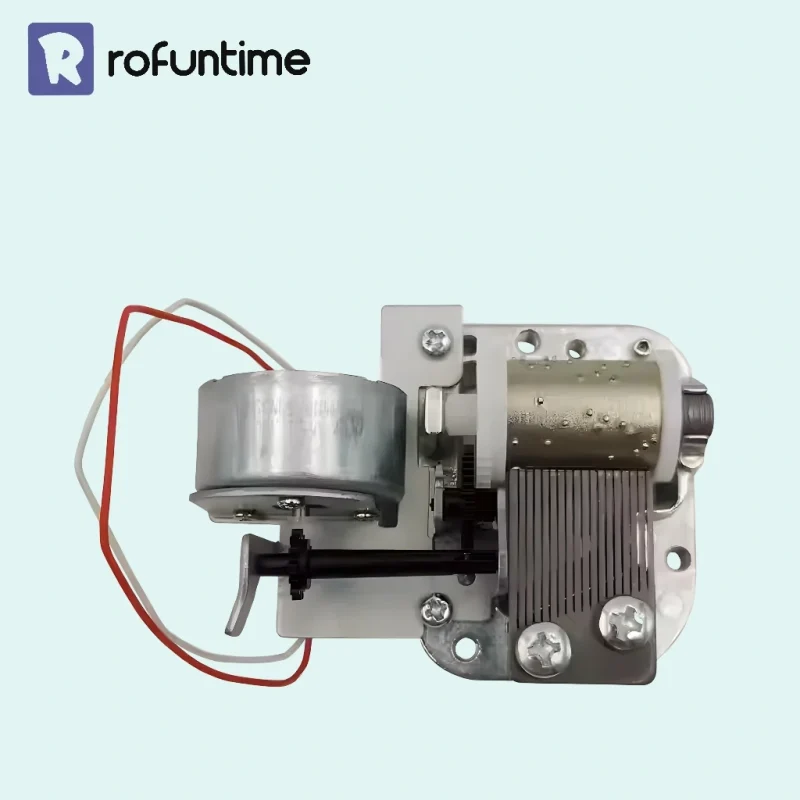 Close up of 18 note music box mechanism drum and metal comb teeth