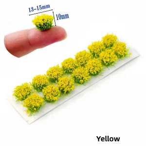 Primary yellow miniature flowers for diorama arranged on a convenient peel-and-stick self adhesive strip.