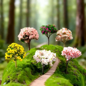 Selection of six miniature flower trees including cherry blossom and flame tree for dollhouse scenes.