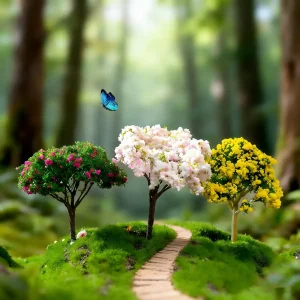 Three diverse miniature flower trees arranged on a mossy hill to showcase varied seasonal landscape heights.