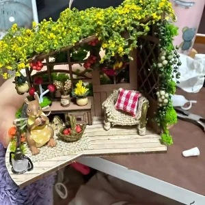 Green model foliage vines climbing a wooden miniature house, realistic miniature plants for diorama makeover.