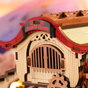 Japanese sushi boat model kit bow view featuring detailed wooden deck and nautical theme accents.