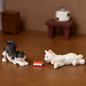 Playful black and white miniature cat figurines resin with white cat for dollhouse accessories.