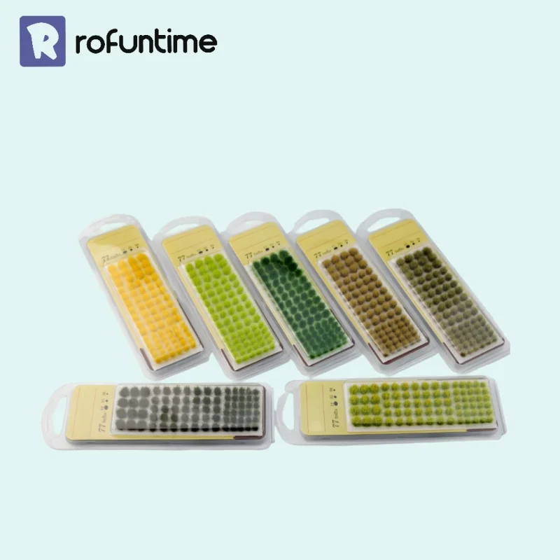 Multi-color static grass tufts set for miniature dioramas, wargame terrain, and model landscaping.