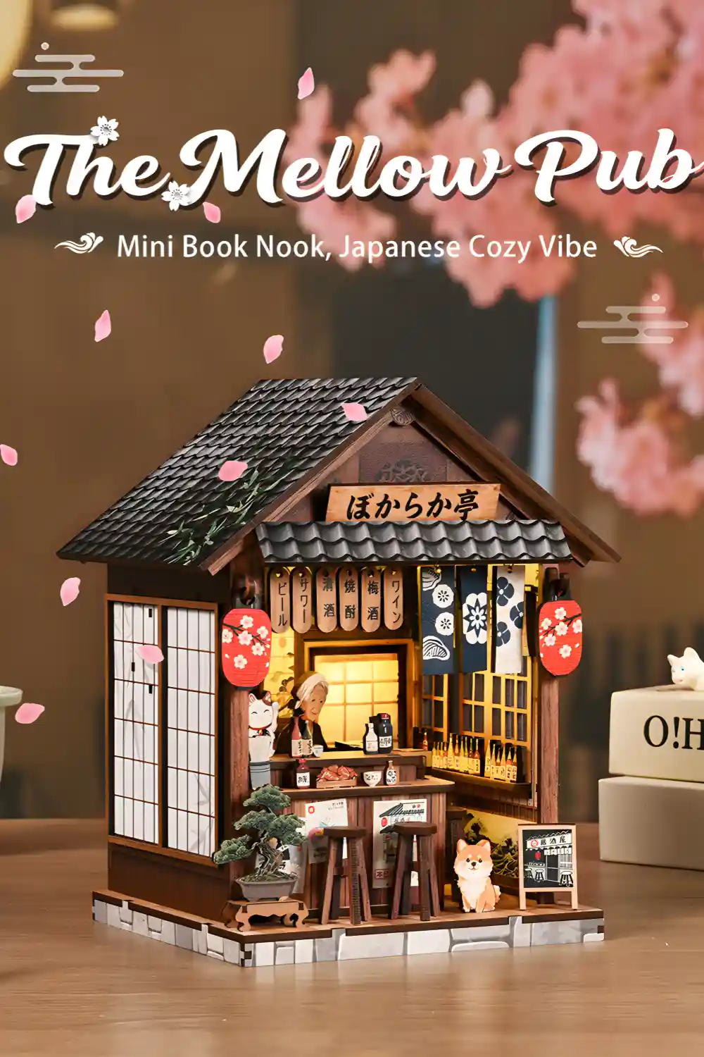 The Mellow Pub miniature book nook with falling cherry blossom petals
