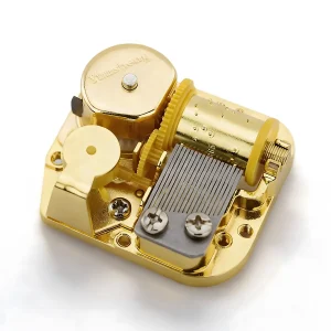 Polished gold plated Yunsheng 18 note music box mechanism for hobbyists and makers.