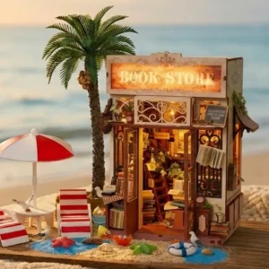 DIY coastal miniature scene using sunset beach miniature decor next to art bookstore kit.