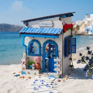 Pristine studio shot of the completed Beach Corner DIY Book Nook Kit on light background.