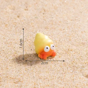 Hermit crab miniature beach accessories toy on sand background showing exact dimensions.