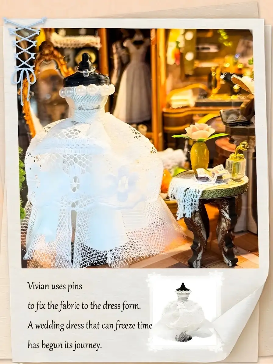 Handmade lace wedding dress display inside a romantic book nook kit miniature tailor studio