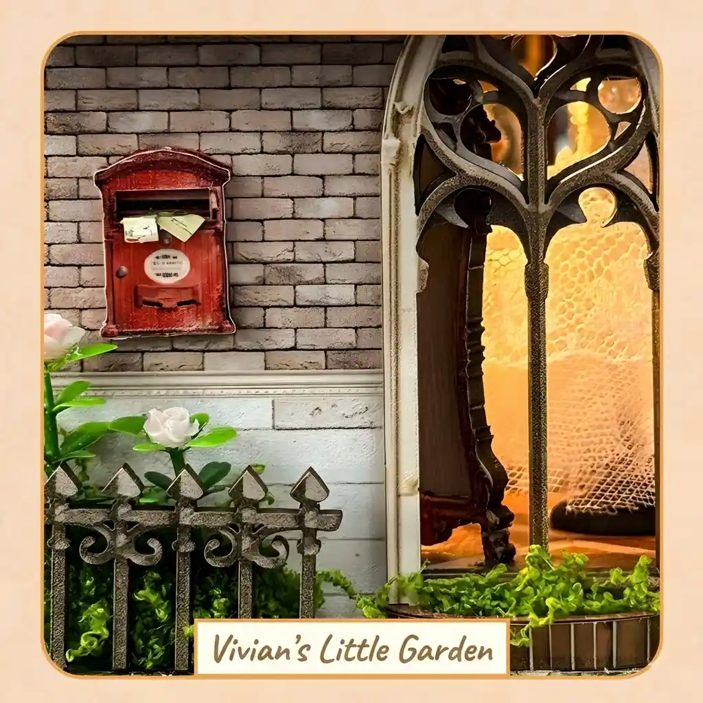 French vintage book nook exterior detailing a red mailbox, picket fence, and mini garden