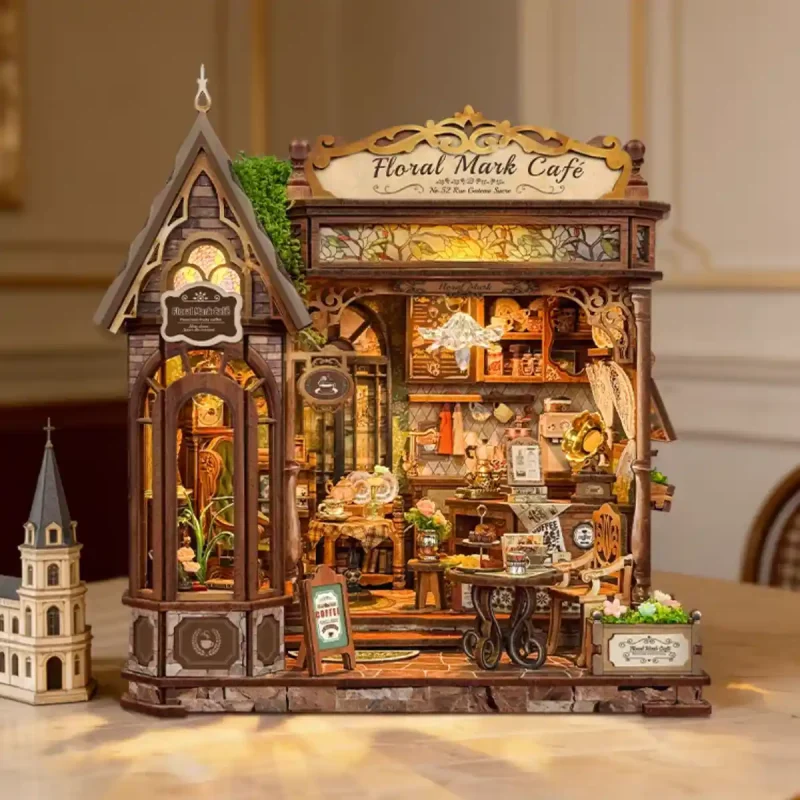 Victorian Book Nook Kit with glowing warm LED lights and elegant glass conservatory