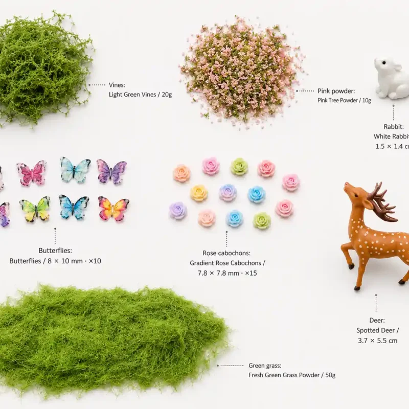 Forest Miniature Kit full contents layout showcasing grass powder, vines, rose cabochons, and animal figurines.