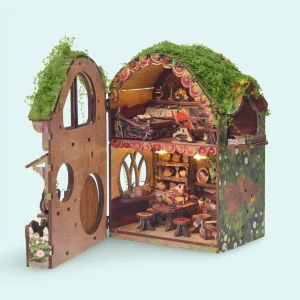 Forest cottage miniature scene with a unique openable hinged design revealing detailed rooms