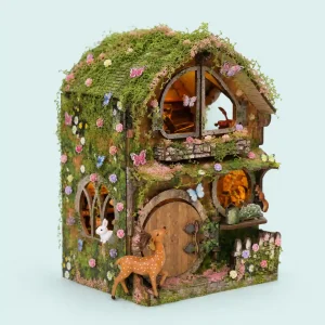 Forest Theme Kit applied to a miniature cottage with colorful woodland miniature decorations and butterflies.