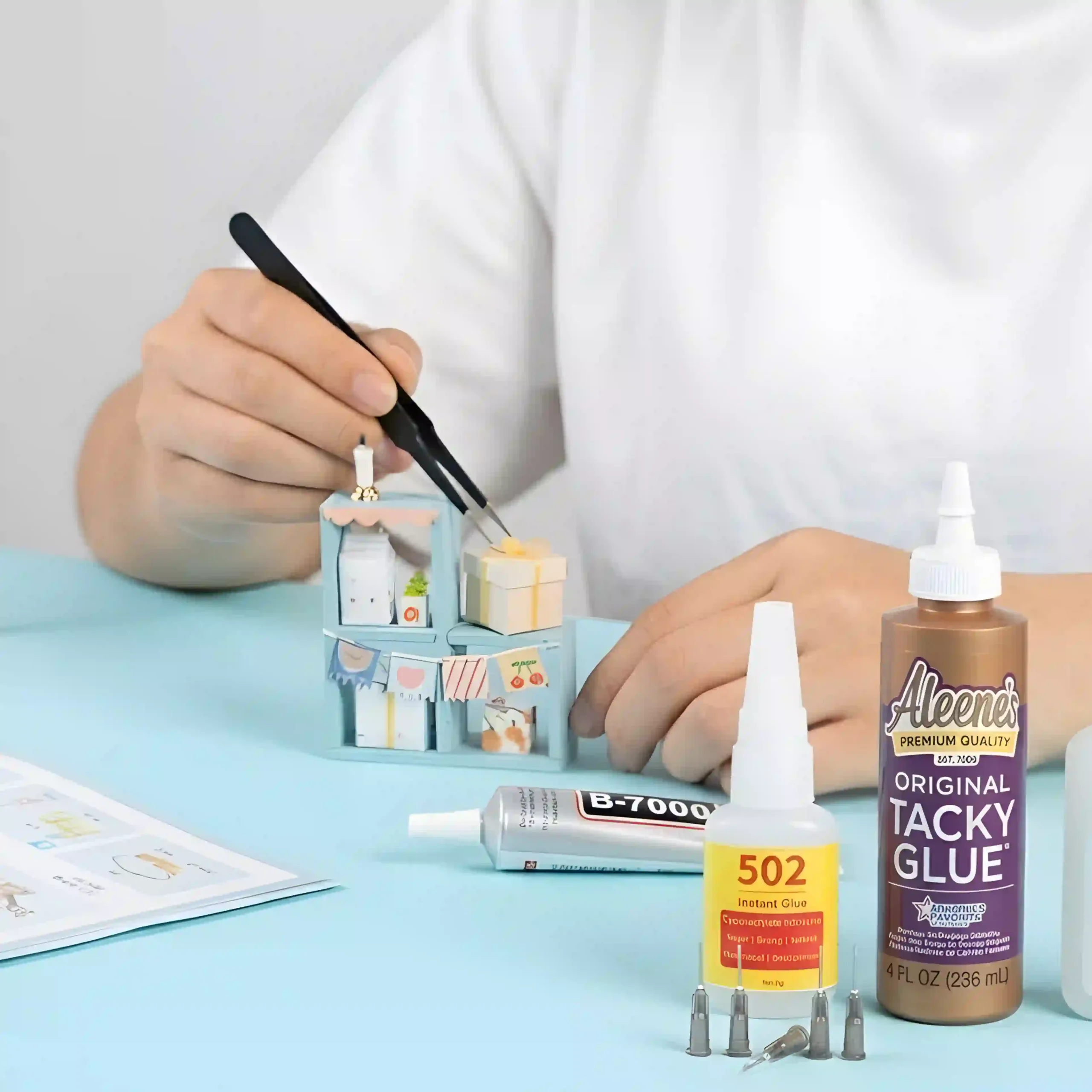 Best glue for book nooks selection including Tacky Glue B-7000 and super glue