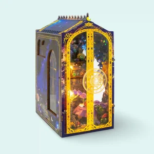 Magical Book Nook Kit showing closed gilded double doors with a glowing astronomical dial design
