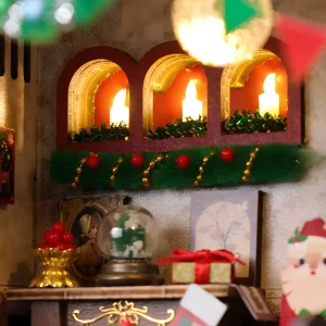 Cozy European Christmas cottage interior detail with glowing wall candle lights, snowglobe, and gift.
