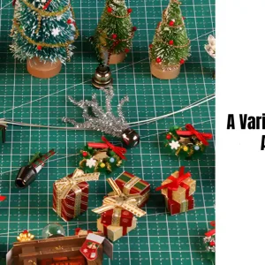 A variety of Christmas DIY craft accessories including mini trees, gift boxes, and snowman figurine.
