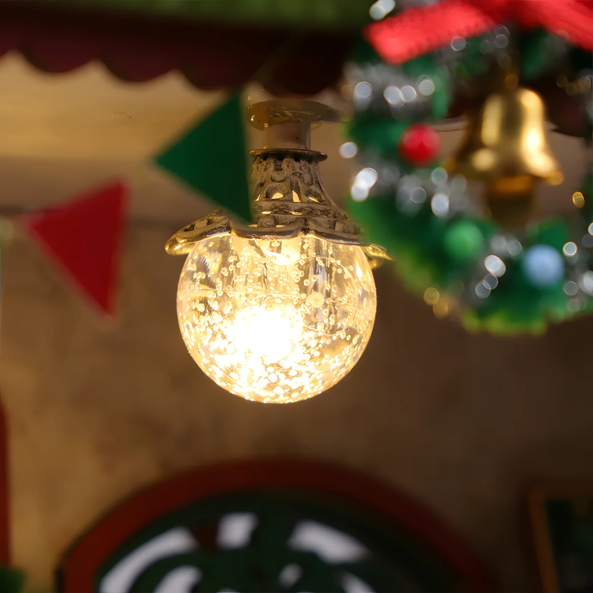 Glowing vintage crystal pendant light fixture in European Christmas cottage miniature interior.