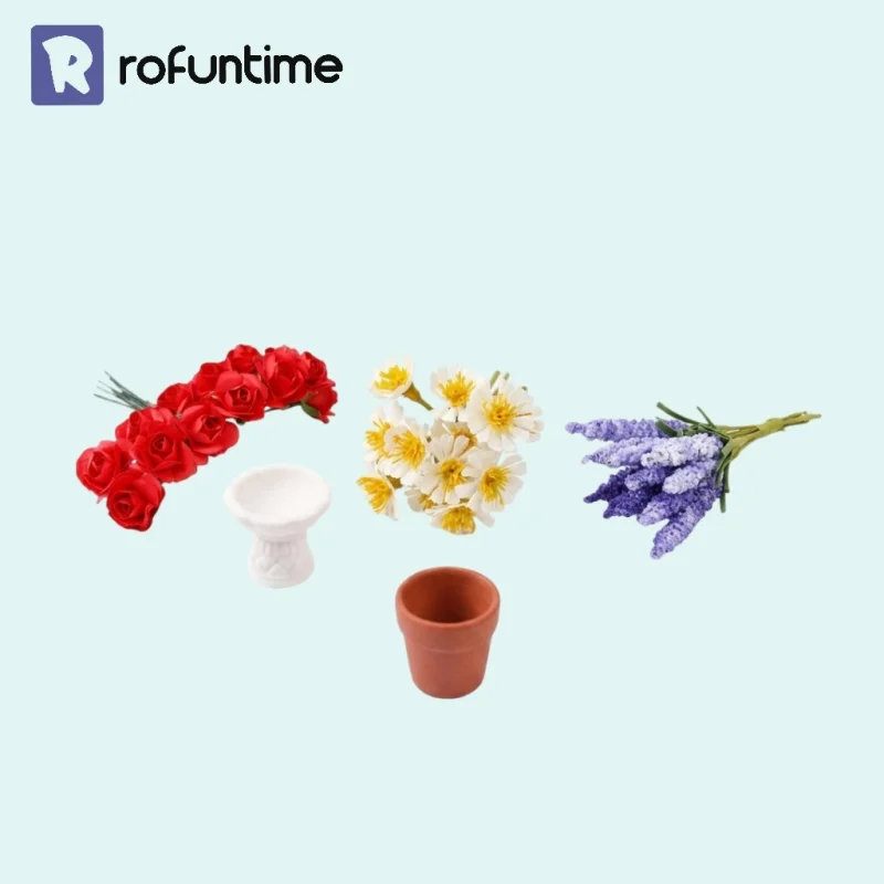 Cottage garden miniatures set featuring miniature flowers, white planter, and terracotta pot for DIY scene.