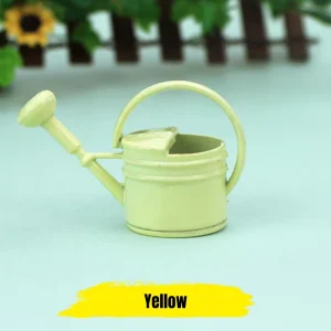 Miniature watering can light green yellow for cottage garden scene and DIY book nook customization.