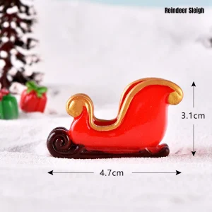 Red and gold miniature Santa sleigh for Christmas village accessories and holiday crafting
