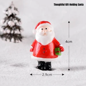 Thoughtful Santa Claus miniature holding green present box for Christmas scene accessories