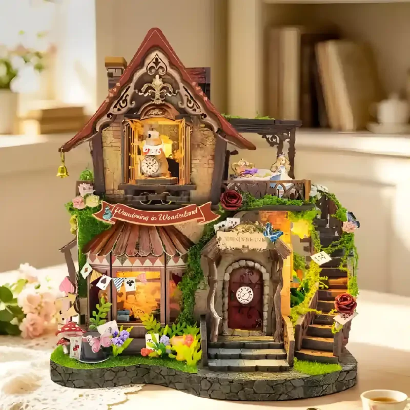 Illuminated Dreamy Cottage Book Nook displayed as cozy shelf decor on a table.