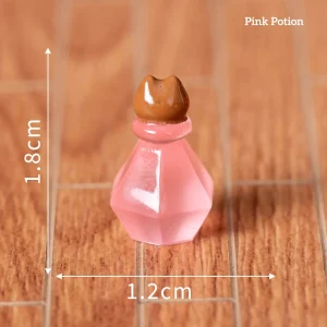 Pink faceted miniature potion bottles with brown stopper for wizarding decor