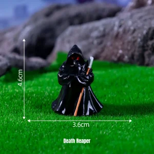 Hooded grim reaper miniature figurine with scythe for Gothic manor decor and dark themed miniature scenes