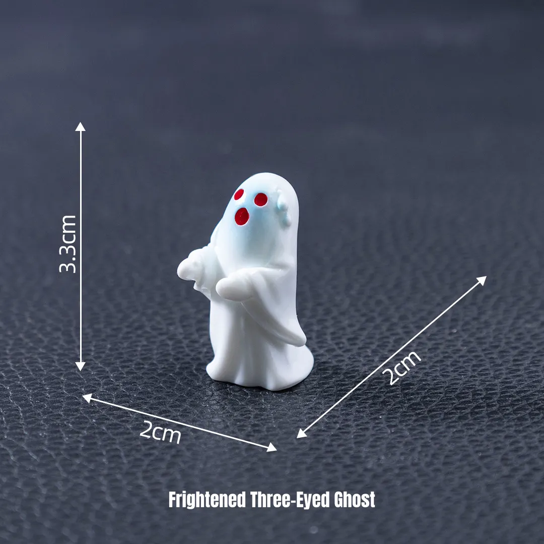 Frightened white ghost miniature Halloween figurines with three red eyes for spooky miniature scene customization