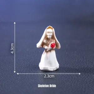 Miniature skeleton bride holding red bouquet for Gothic Halloween miniature decorations