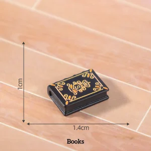 miniature book nook accessories, detailed black spellbook prop with gold ornate patterns and size dimensions