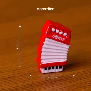 Red accordion miniature musical instruments prop for DIY book nook accessories and scene decor.
