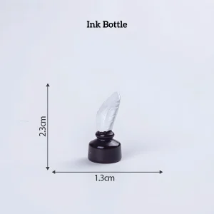 Vintage ink bottle with quill feather, essential miniature literary decor for DIY book nook accessories.