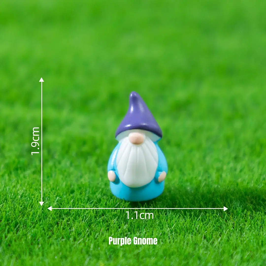 Small gnome miniature figurines with purple hat on grass for fairytale garden scenes