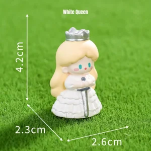 White Queen miniature characters with silver crown and sword on green lawn decor