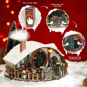 Snowy miniature house featuring interactive round door, courtyard gate, and warm fireplace lighting