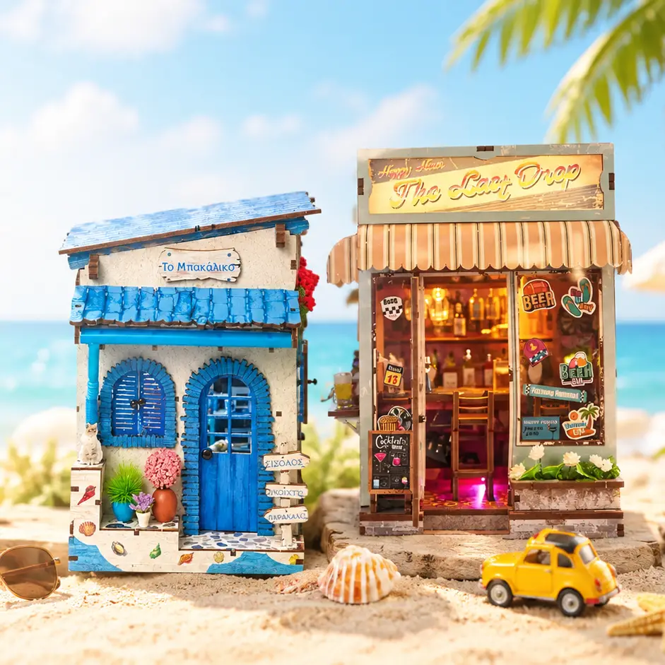 Mediterranean miniature house and illuminated beach bar miniature set on sandy beach