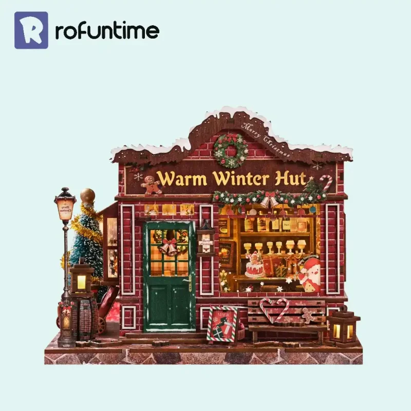 Warm Winter Hut Book Nook featuring a cozy Christmas miniature tavern with illuminated window display.