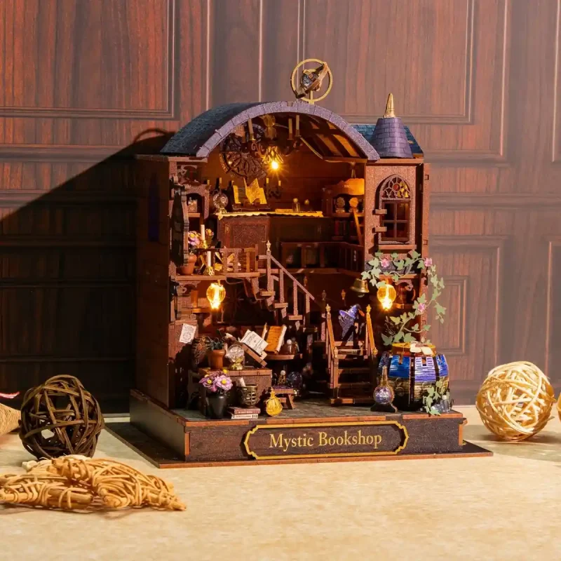 Fully assembled Mystic Bookshop Miniature House DIY wooden model kit with warm LED lighting